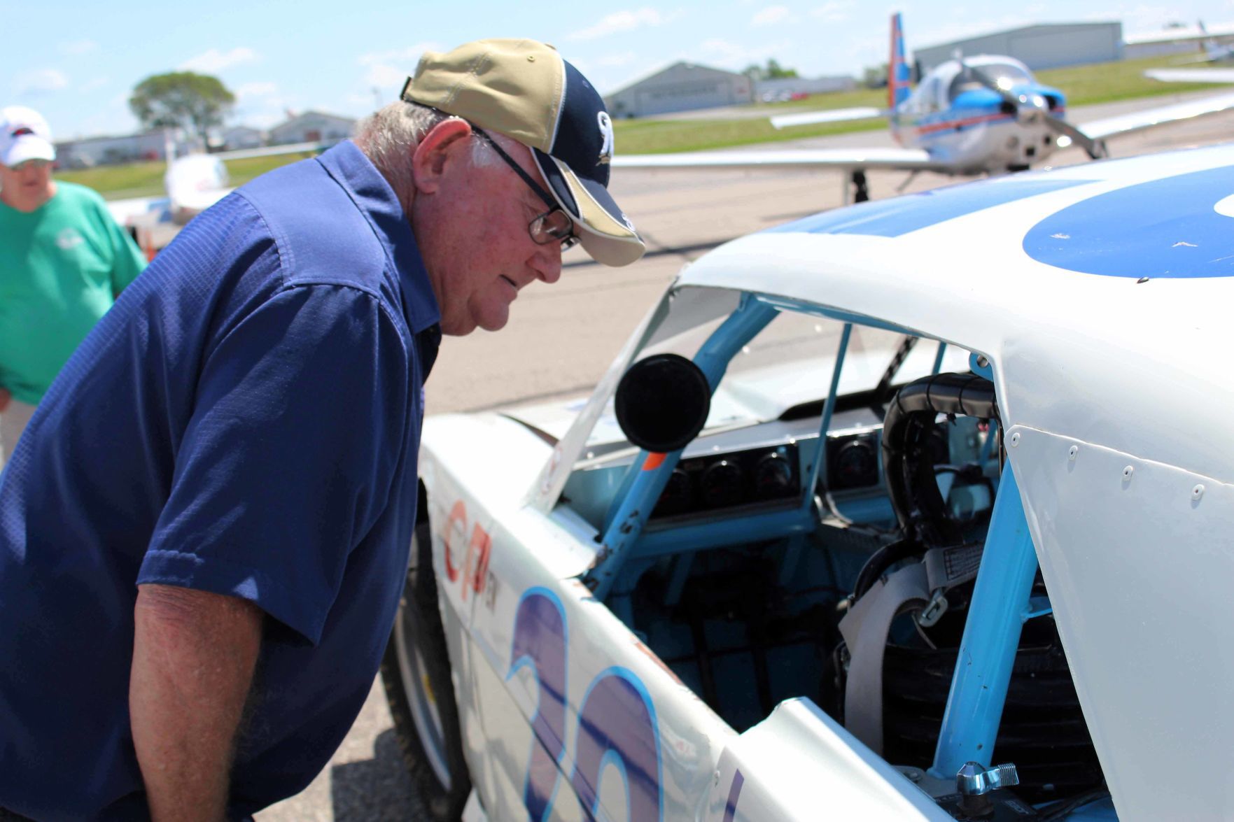 Gary looks at car